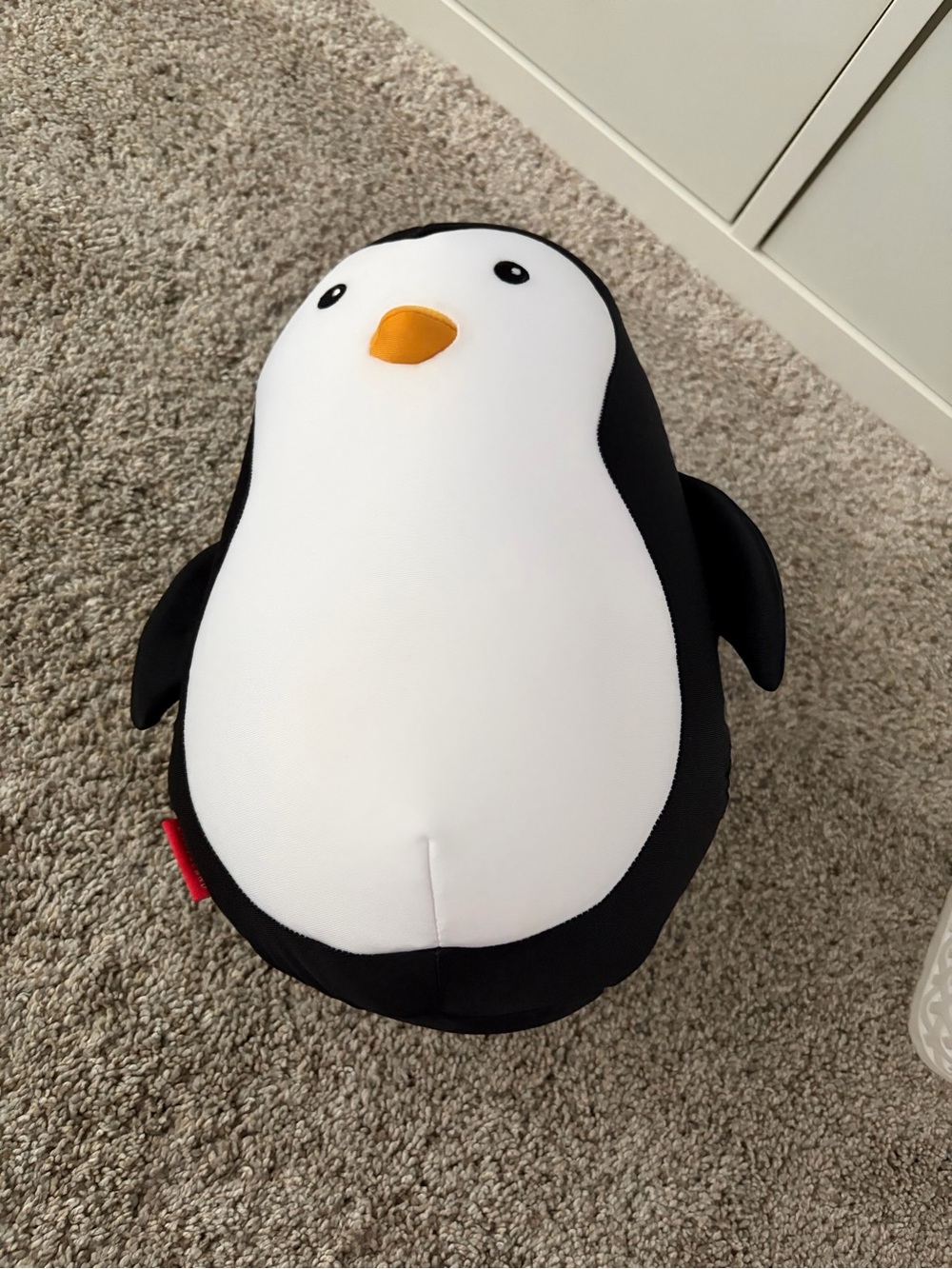 Kikkerland Black White Penguin Plush with Orange Beak (turns into travel pillow)